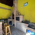 Casa com área gourmet.