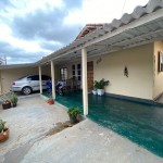 Casa com 03 dorm. e edícula.