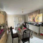 Casa com 03 dorm. e edícula.