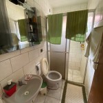 Casa com 03 dorm. e edícula.